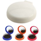 Hairbrush With Mirror Glance